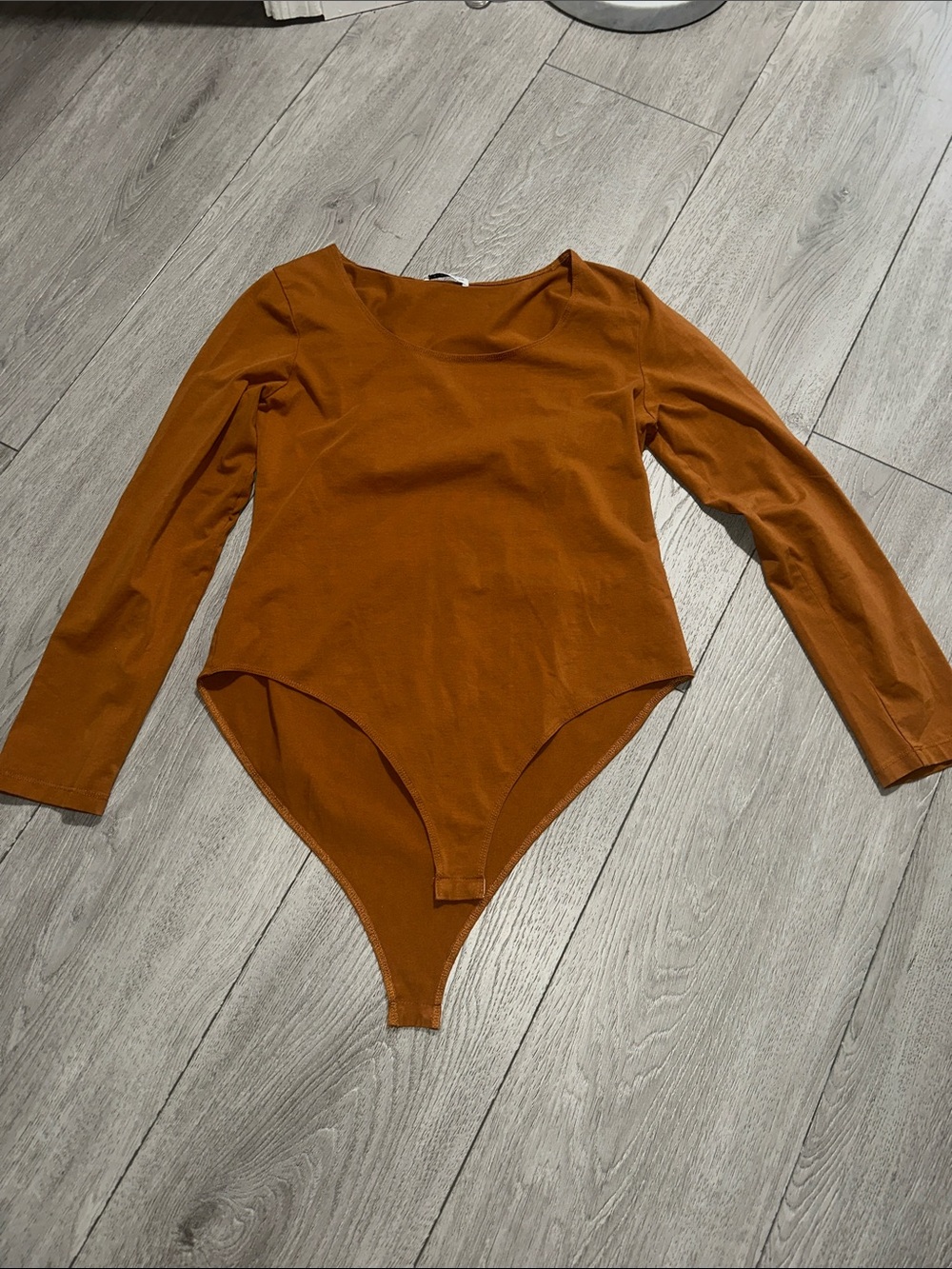MangoPop Long-Sleeve One-Piece Bodysuit in Rust Orange size XXL